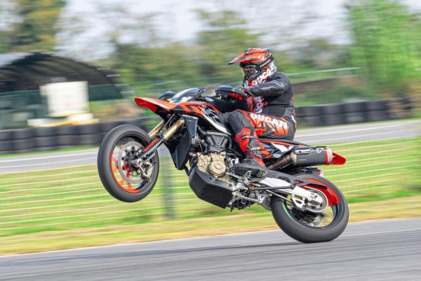 Ducati 698 Hypermotard mono wheelie on track