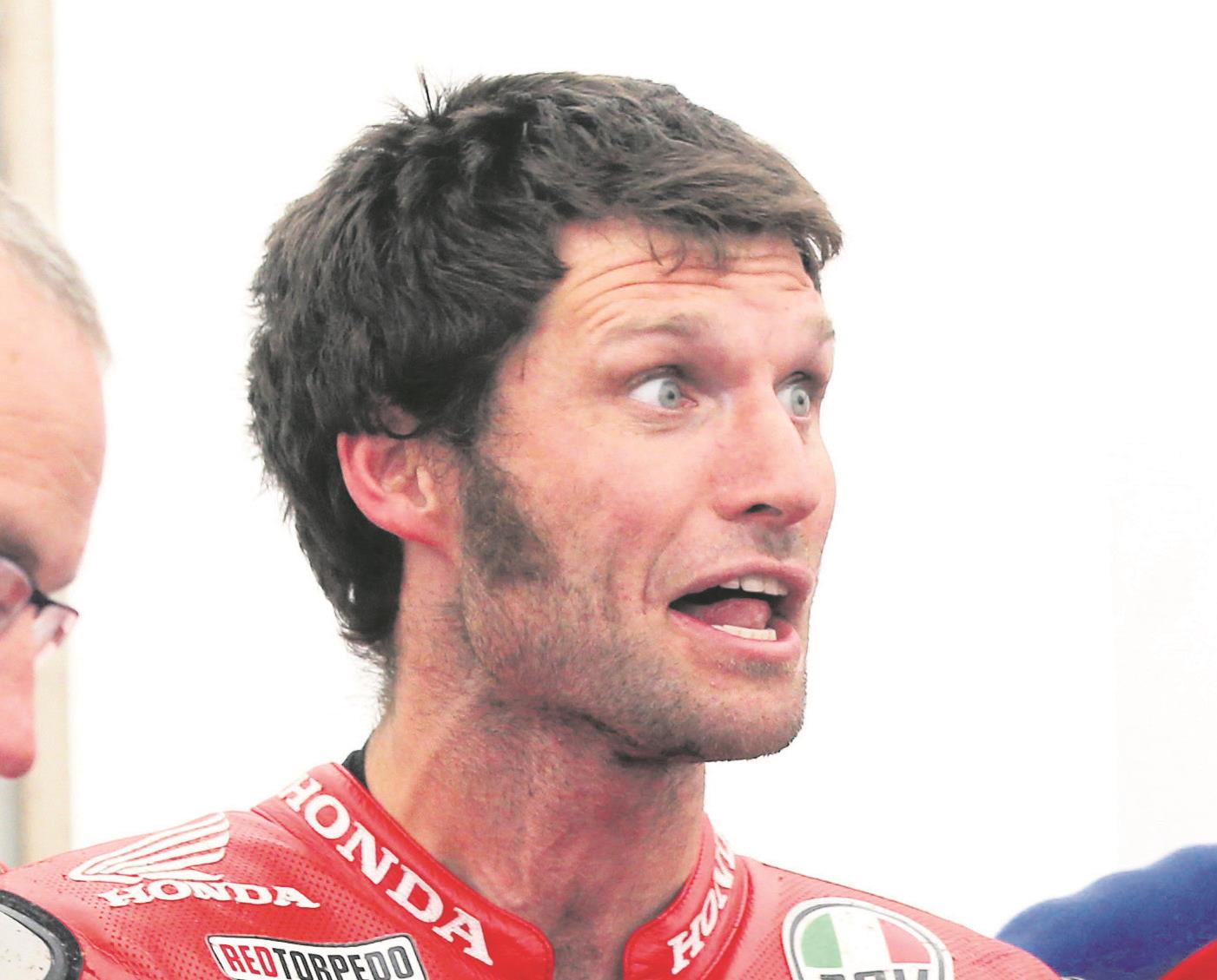 Road Racing star Guy Martin takes a tumble at Beach Race