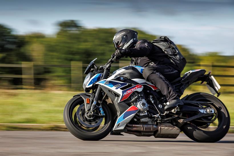 Ben Clarke riding a 2023 model BMW M1000R