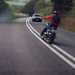 A motorcyclist crosses double white lines in footage submitted to Operation Snap