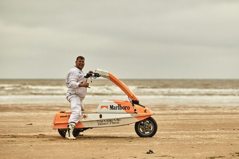 The Malle Beach Race attracts an unusual mix of motorcycles. Pictured, a rider poses with his jetski inspired beach racing machine