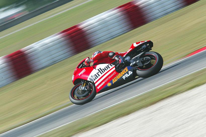 Capirossi banked over on track