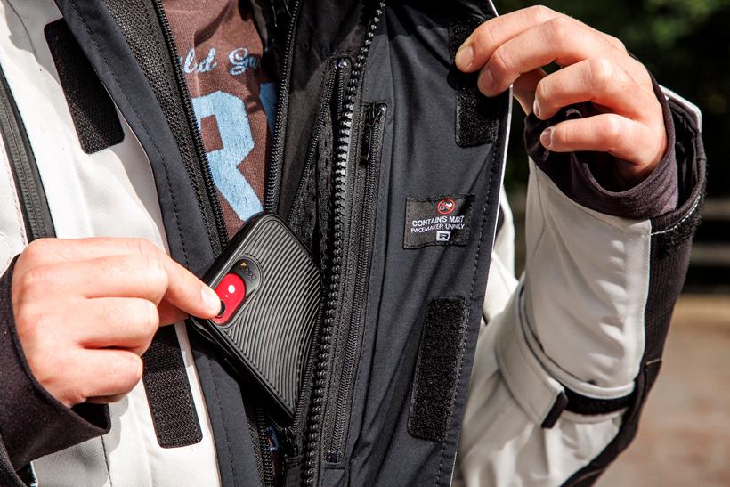 Front zip closure on the Richa Atlantic 2 jacket, showcasing the inner pocket with a phone inside