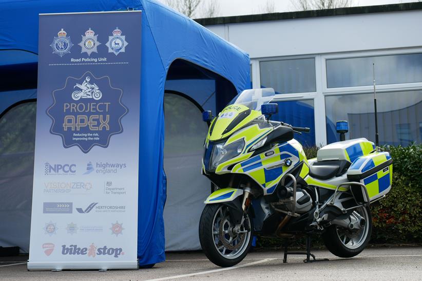 Police bike with Project Apex banner