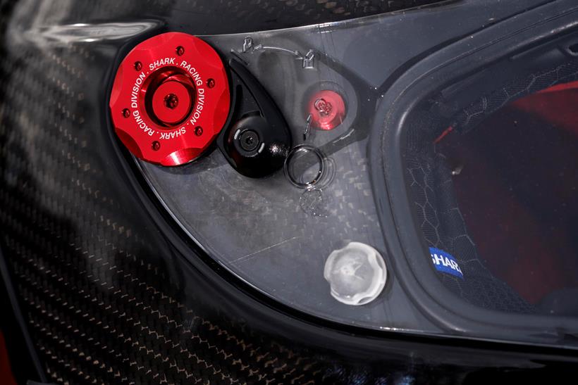 The Shark Race-R Pro GP FIM helmet, close up of the visor locking mechanism