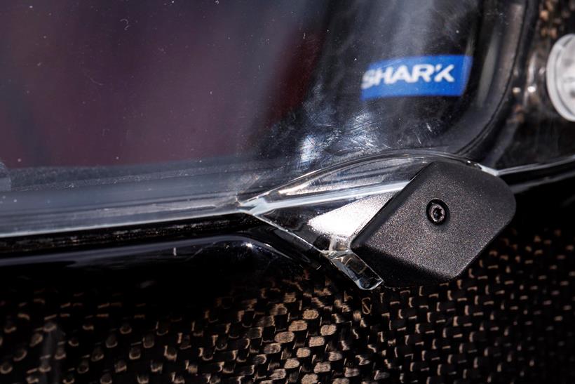 The Shark Race-R Pro GP FIM helmet, close up of the visor release