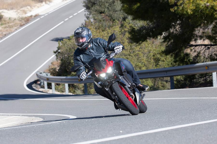 2024 Kawasaki Z500 turning right on the road