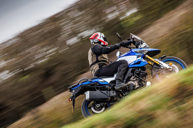 2024 Suzuki V-Strom 1050 DE riding through the countryside