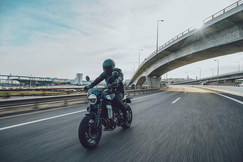 Husqvarna Svartpilen frontal shot of rider on road