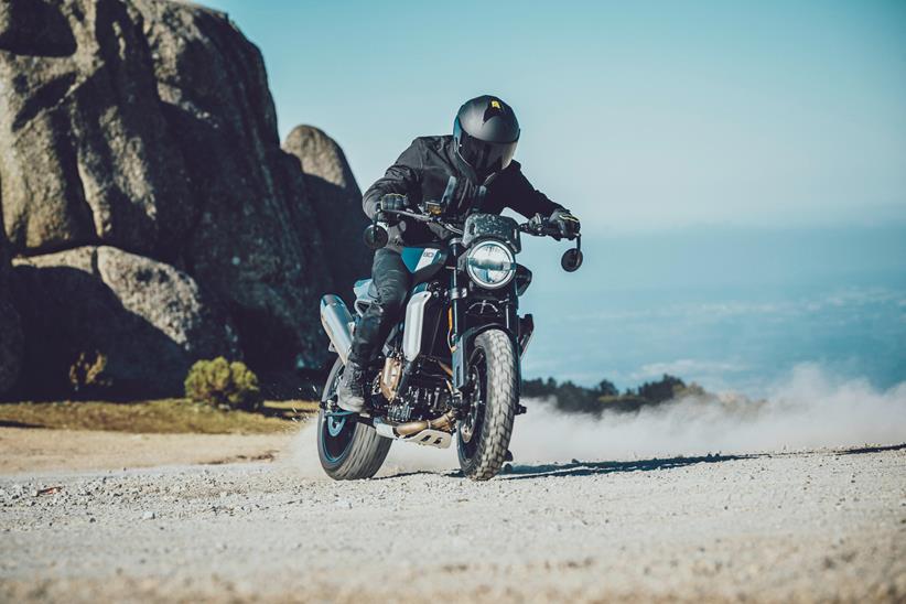 Husqvarna Svartpilen sliding in the gravel