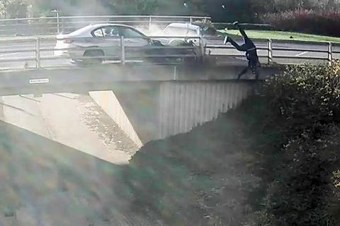 Driver jailed after horrifying 'road rage' attack sends motorcyclist flying through the air