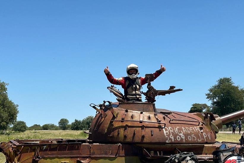 Paul Gee in an old Angolan tank