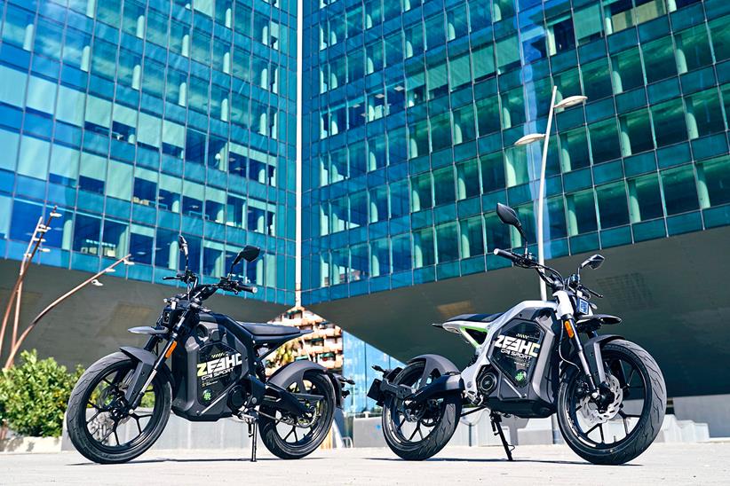 Zeeho City Sport bikes parked in front of an office building