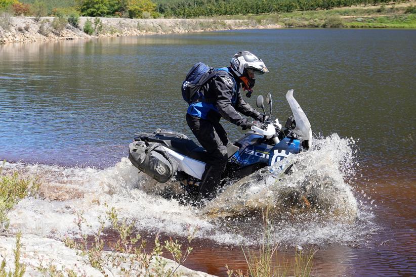 Husqvarna Norden 901 entering a body of water