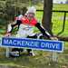 Niall Mackenzie poses with the sign for Mackenzie Drive at Knockhill