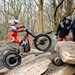 Young riders tackles a tricky rock slab on his electric Oset