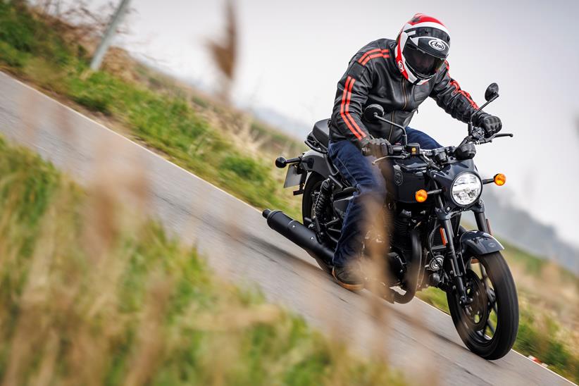 Royal Enfield Shotgun 650 leaning into a right hand bend