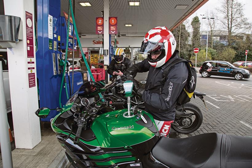 Rider refuelling Kawasaki ZZR1400