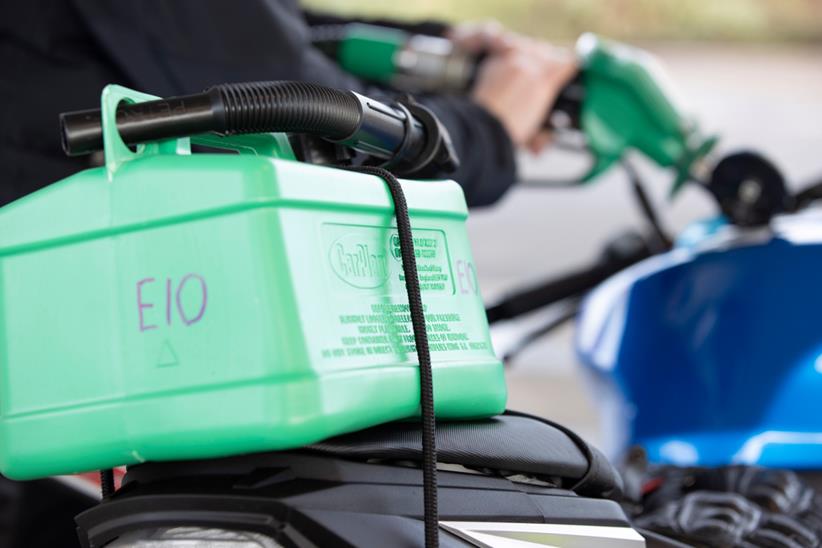 Jerry can on back of motorcycle