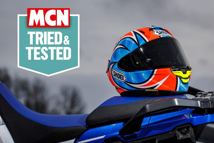 Shoei X SPR Pro helmet on motorcycle seat