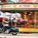Indian Challenger Dark Horse vs Harley-Davidson Road Glide - Harley riding past a fair