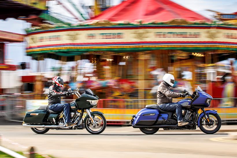 Indian Challenger Dark Horse vs Harley-Davidson Road Glide - riding past a carousel 