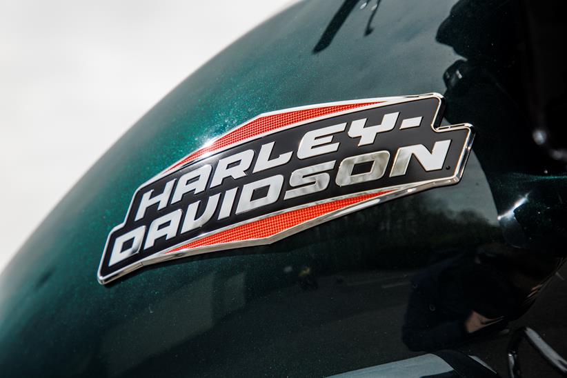 2024 Indian Challenger Dark Horse vs Harley-Davidson Road Glide - close up shot of Harley tank badge