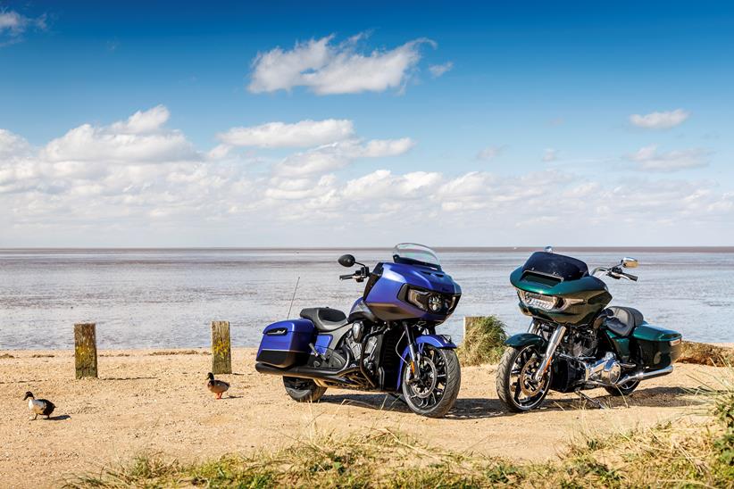 2024 Indian Challenger Dark Horse vs Harley-Davidson Road Glide - static shot on beach with ducks in foreground