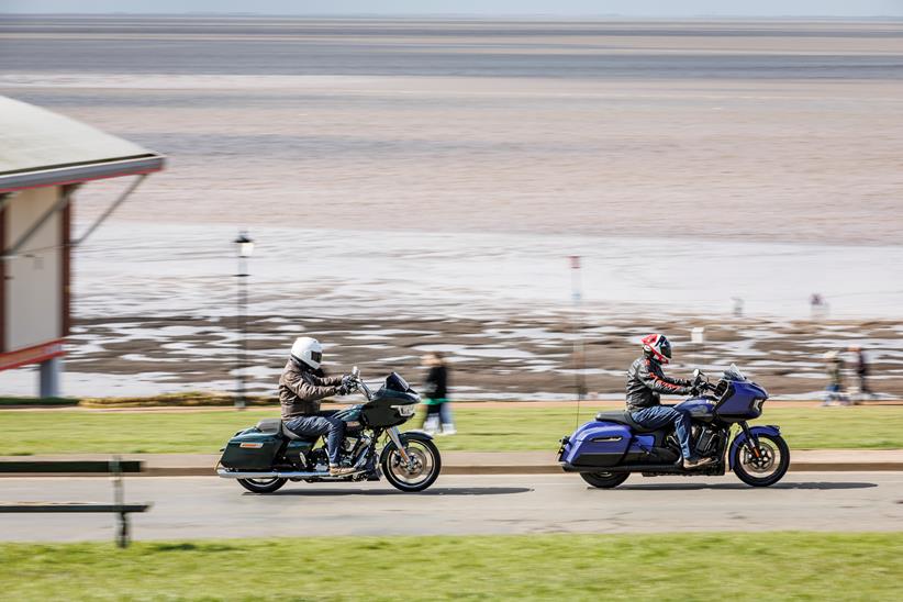 2024 Indian Challenger Dark Horse vs Harley-Davidson Road Glide - riding by with beach front back drop