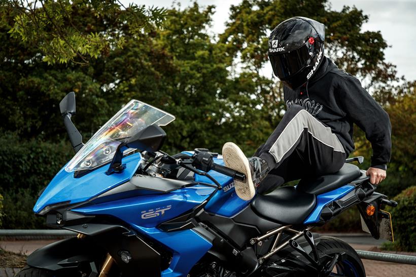 Motorcycle thief breaking steering lock