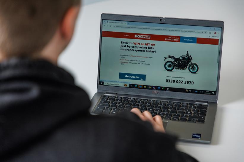 Motorcyclist looks online at MCN Compare in search of motorcycle insurance