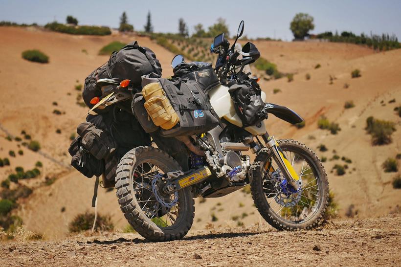 The Adventure Spec Magadan MK3 panniers, pictured in use in Africa