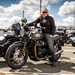 A motorcyclist sat on a Triumph Speed Twin 900