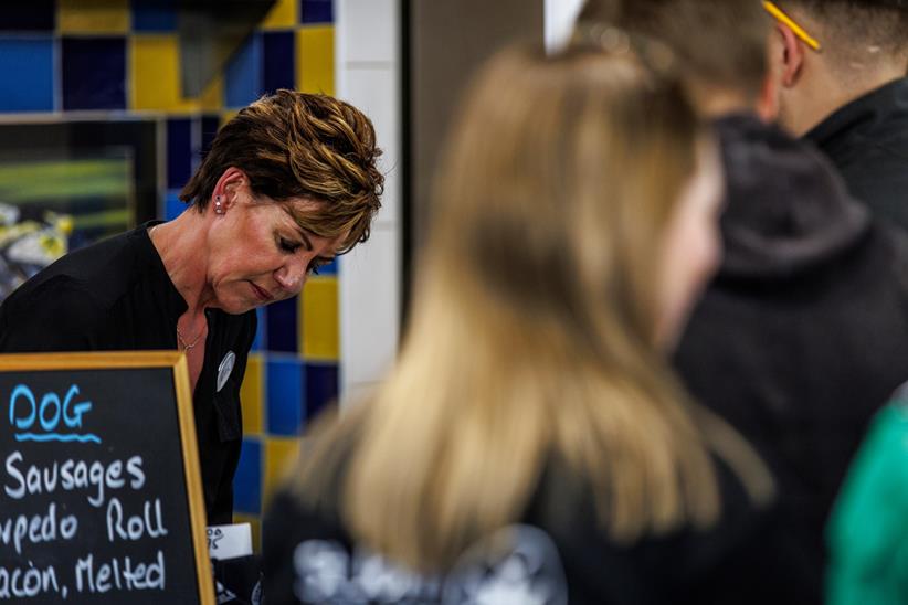 Super Sausage owner Gail Murray serving customers