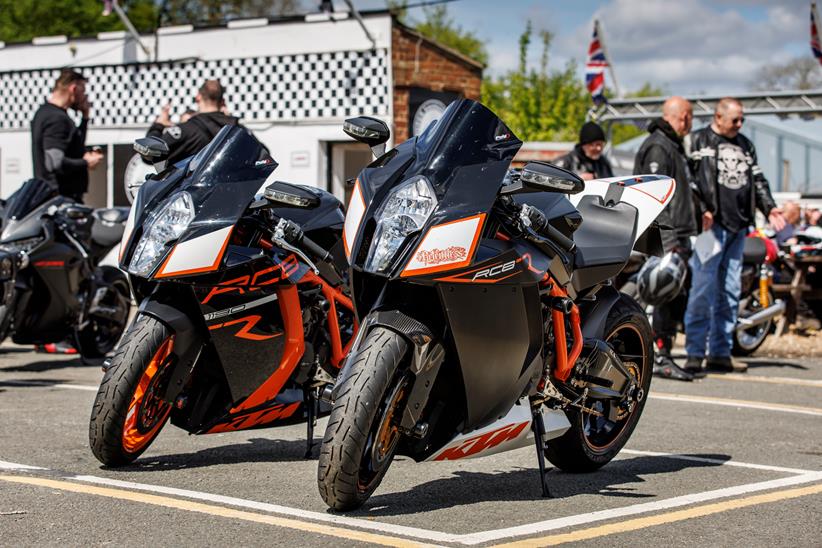 Two KTM RC8s parked outside the Super Sausage Cafe