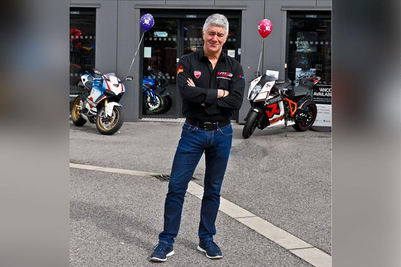 Frank Hayes standing outside SMC Bikes