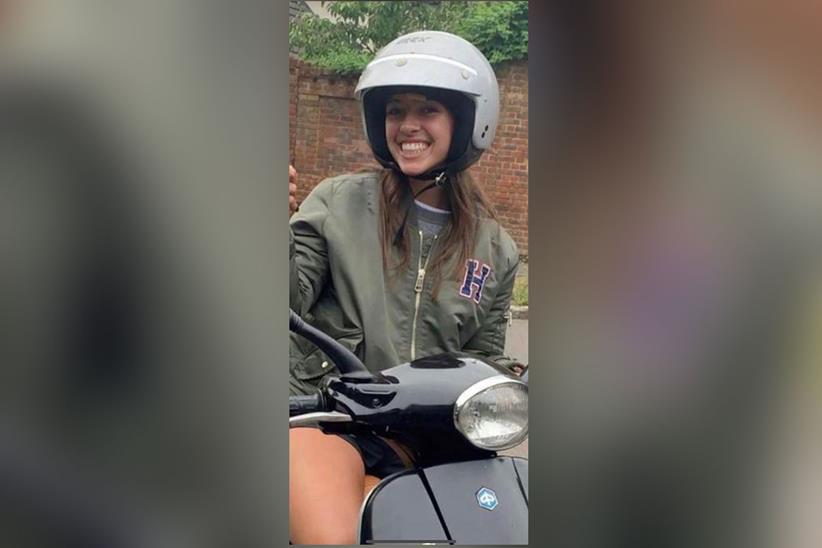 Grace aboard her "beloved" Vespa