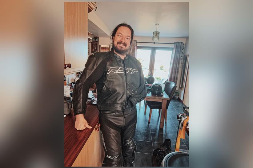 Portrait of Joseph Parry in his RST leathers