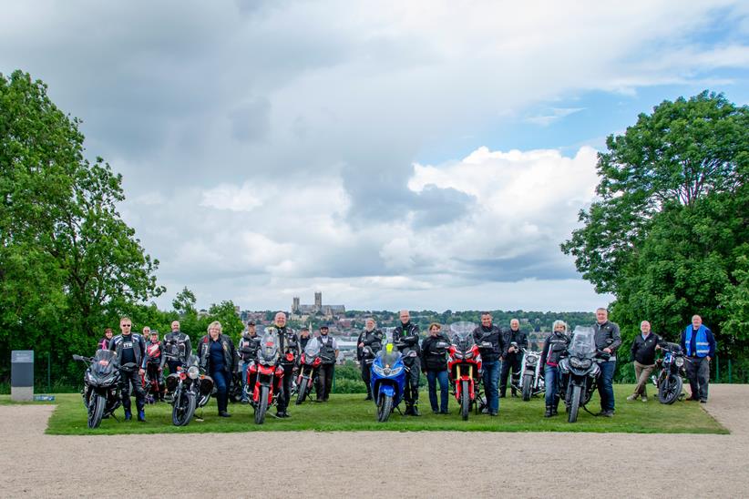 Motorcycles parked together in a group