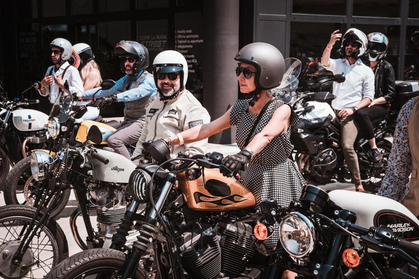 A women rides her Harley Davidson at the DGR - Credit Distinguished Gentleman's Ride