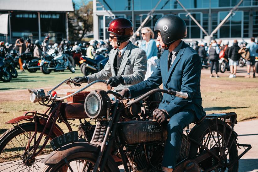 Two riders dressed in their best and sat aboard classic motorcycles - Credit Distinguished Gentleman's Ride