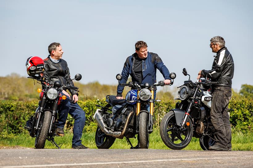 2024 Triumph Speed 400, Royal Enfield HNTR 350, Husqvarna Vitpilen 401 Group Test - Jon and colleagues discussing the bikes