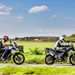 2024 BMW F900GSA and Triumph Tiger 900 Rally Pro - riding in line down a country road