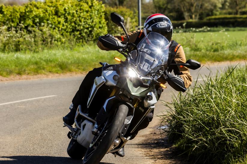 2024 Triumph Tiger 900 Rally Pro - cornering riding towards camera