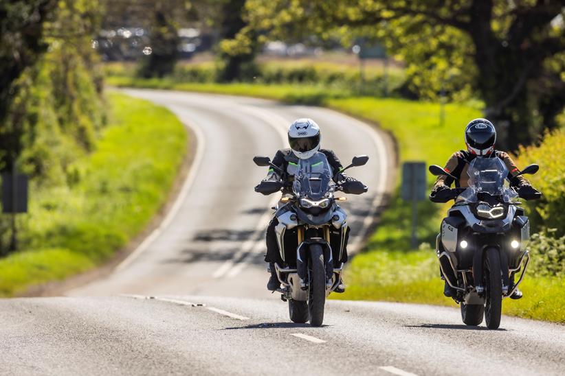 2024 BMW F900GSA and triumph tiger 900 Rally Pro - riding down road towards camera