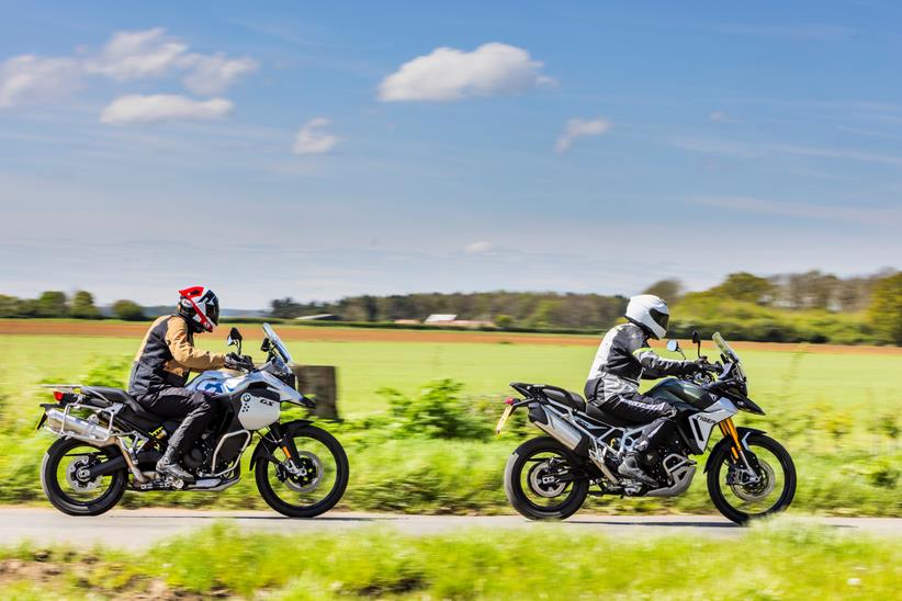 2024 BMW F900GSA and Triumph Tiger 900 Rally Pro - riding in line down a country road