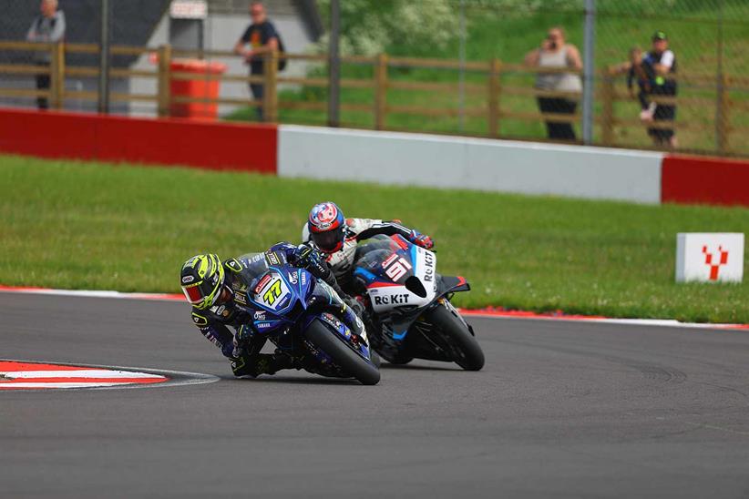 Kyle Ryde leads Leon Haslam during race one at Donington