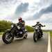 2024 BMW R12 and 2024 Harley-Davidson Nightster Special riding side by side