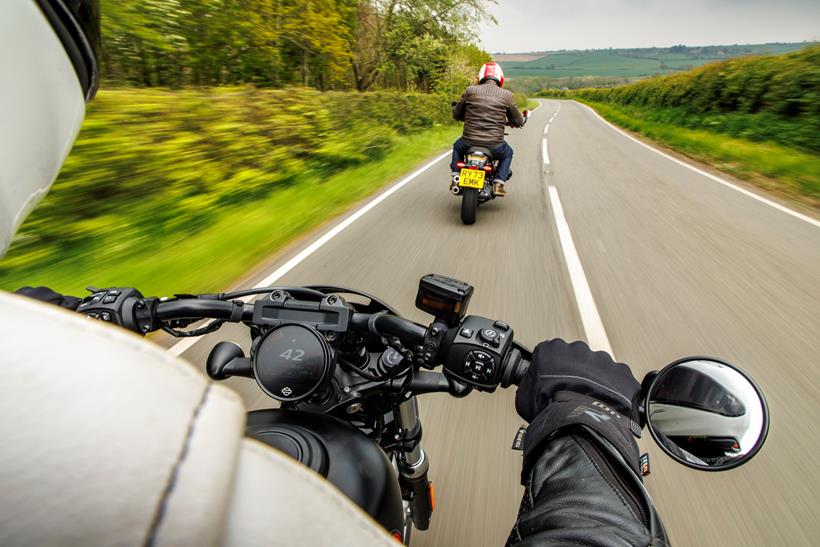 2024 Harley-Davidson Nightster Special on board shot of the back of the BMW whilst following it