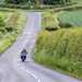 2024 BMW F800GS riding down a country road